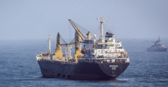 The MV Meridian Aurora Continues Through The Straight